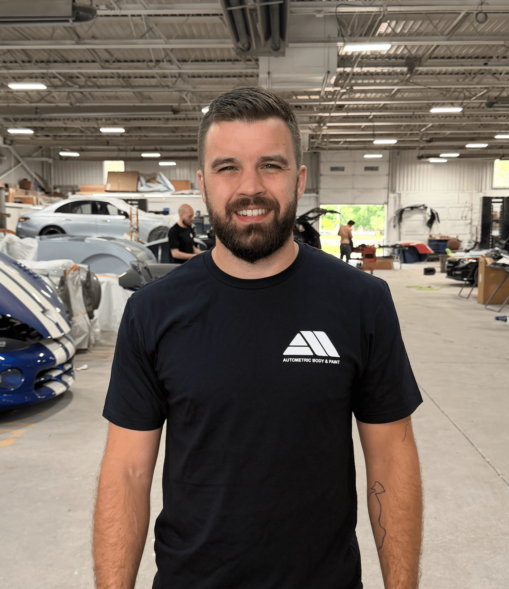 Adam Skelly, owner of Autometric Body & Paint in Pontiac, MI